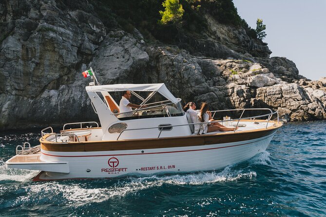 Capri and Amalfi Coast tour departing from Positano - Capri town highlights: Augustus Gardens and Faraglioni views