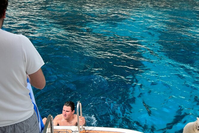 Capri, Blue Grotto by Priority, Faraglioni Swim and City Visit - Cala del Rio, Heart Cave, and calm-water swim breaks