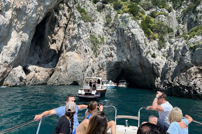 Capri, Blue Grotto by Priority, Faraglioni Swim and City Visit - Aperitif at Punta Ventroso, then Mermaid’s Rock vibes