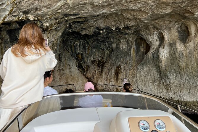 Capri Boat Tour and Blue Grotto Visit - Stop-by-Stop: Marina Grande, Baths of Tiberius, and Capri’s Roman-Era Coast