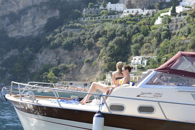 Capri Boat tour from Positano with Light Lunch, Drinks & Swim - The Capri Cruise: Grotta Bianca, Grotta Verde, and Photo Windows