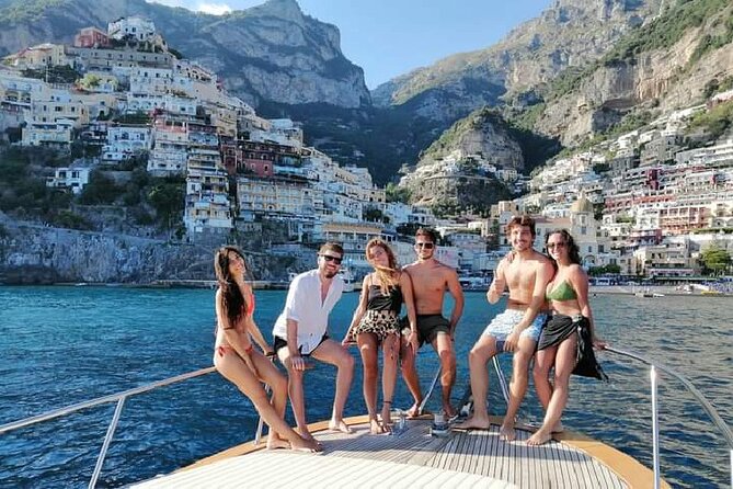 Capri Collective Boat Excursion from Positano - Swim breaks with towels and soft drinks: what to expect
