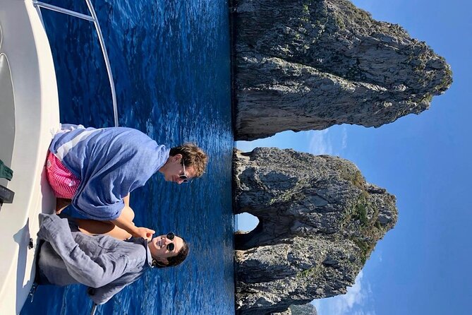 Capri Private Boat Excursion from Positano - Capri’s coastline by boat: caves, rock formations, and bay stops