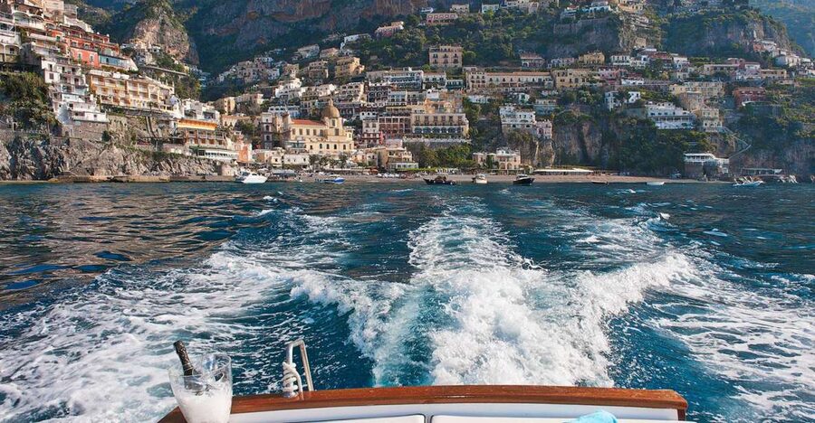 From Amalfi: 7H Amalfi Coast - Group Tour by boat - Morning at Darsena Pier: the small-group boat day starts right