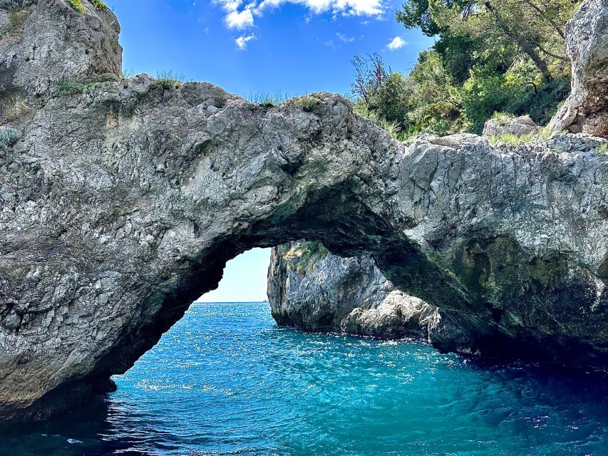 From Amalfi: 7H Amalfi Coast - Group Tour by boat - Swim stops: cool off where the coast looks unreal