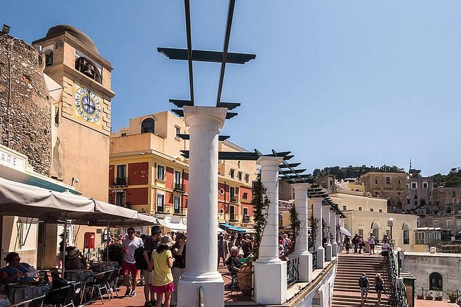 From Amalfi Coast: Capri & Anacapri guided tour by sea & by land - Capri Town walking tour: Piazzetta, Via delle Camerelle, and Augustus Gardens