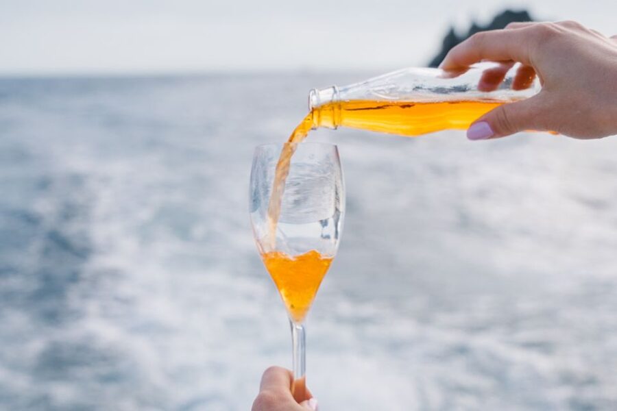 From Positano: Amalfi Coast Sunset Cruise - Group Tour - Marina di Praia: colorful boats and white cliffside houses