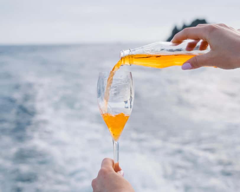 From Positano: Amalfi Coast Sunset Cruise - Group Tour - Sunset over the Amalfi Coast: timing, atmosphere, and photo help