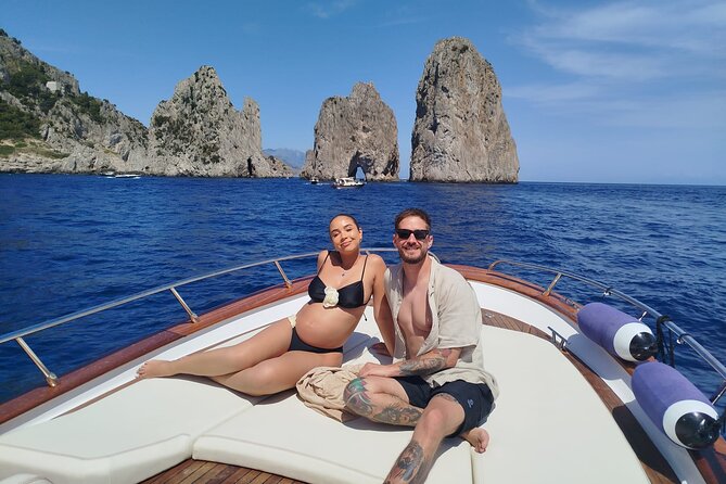 From Positano : Elite Capri Boat Day Free Bar, Brunch & City Walk - Spiaggia Grande and Bagni di Tiberio: Capri’s coastline before the big sights