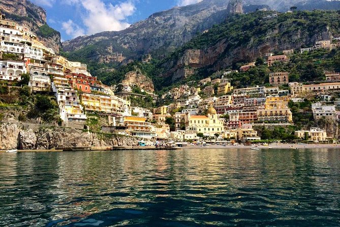 Full Day Private Amalfi Coast Cruise from Positano or Praiano - Onboard comfort: drinks, snacks, towels, and homemade limoncello