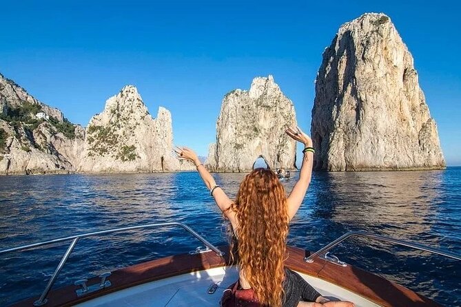 Full Day Private Boat Tour to Capri from Positano - Faraglioni and Punta Carena: iconic rock formations and a calmer sunset spot