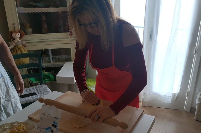 Genuine Home Cooking Class + Wine Tasting - The aperitif welcome: wine tasting happens before the apron