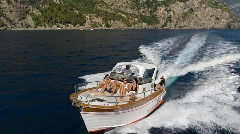 Positano: Amalfi Coast & Emerald Grotto Private Boat Tour - Snorkeling Off Scoglio dell’Isca: What to Expect