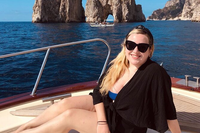 Positano , Praiano to Capri private boat tour - Capri by Boat First: Faraglioni, Grottos, and Punta Carena Views
