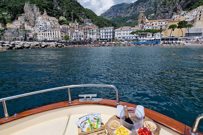 Private Boat Tour Along the Amalfi Coast from Positano - Meeting at Piazza Amerigo Vespucci and getting settled fast