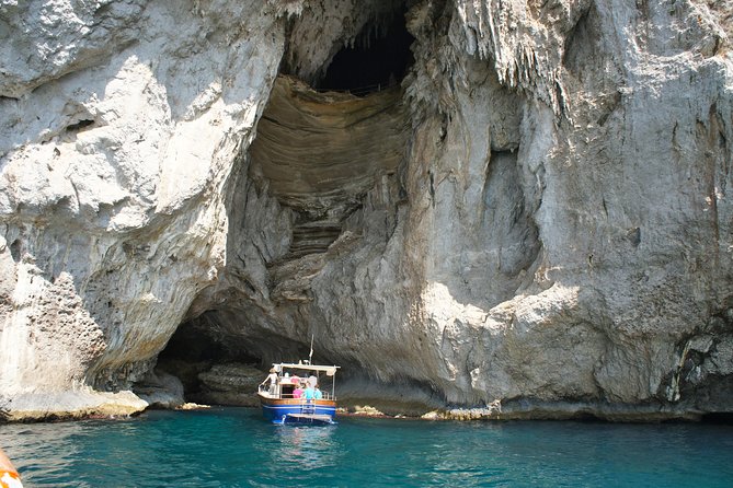 PRIVATE CAPRI ISLAND & BLUE GROTTO Full Day boat tour. - Blue Grotto first: transfer boats, extra tickets, and the 30-minute limit