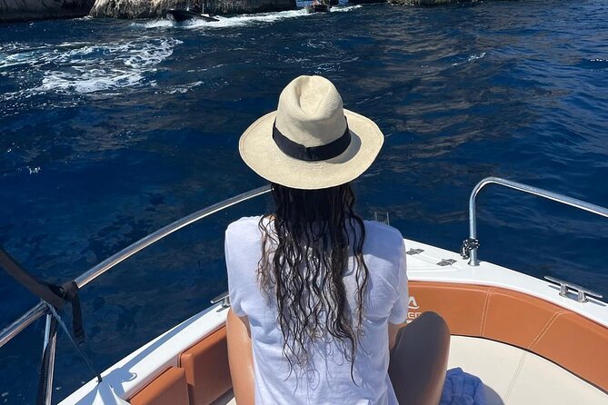 Private Day Boat Trip to Capri and Blue Grotto from Positano - Punta Carena Lighthouse and the jagged coast views