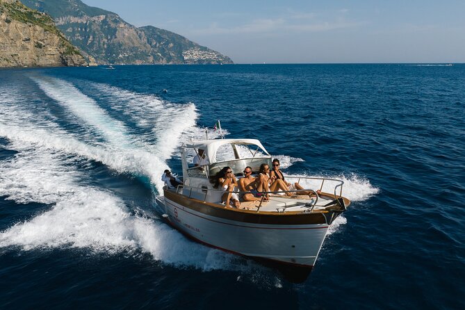 Private Ischia Boat Tour from Positano: Full Day Trip - Baia di San Montano: easy, calm time in Ischia waters