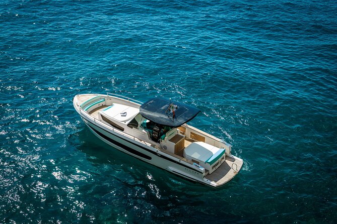 Small Group Tour to Positano by Boat at Sunset - On-board setup: snacks, Bluetooth music, Wi‑Fi, and restroom