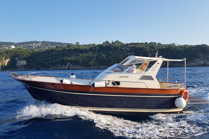 Very Small Group Capri Boat Excursion with Transfer from Positano - On-board vibe: music, drinks, and snacks that actually help